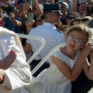Look to the future, not the past, pope tells families