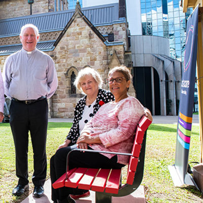 Cathedral precinct gets Brisbane CBD's first Red Bench to open conversations on domestic violence